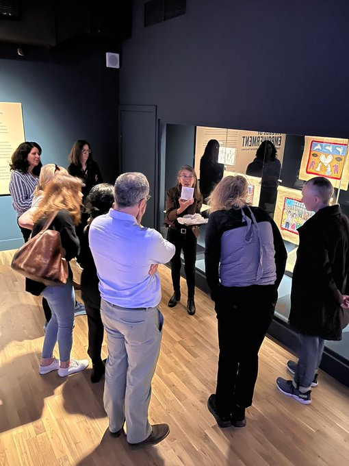 Invitees engaged in background narrative of the pieces on the disappeared. (Photo: Brandon Hamber)